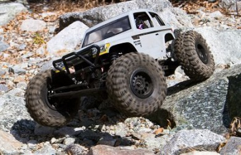 Краулер Axial 1/10 Wraith Spawn 4WD Rock Racer Brushed RTR (белый)