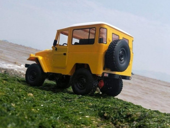 Радиоуправляемая машина WPL Toyota FJ40 (желтая) 4WD 2.4G 1/16 RTR