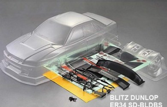Кузов Nissan GTR (R34) Blitz Dunlop не окрашенный с отражателями, наклейками и спойлером 1:10