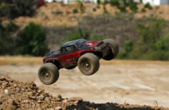 Радиоуправляемый монстр ECX 1:18 Ruckus Monster Truck 4WD 2.4 Ghz (электро, черный/красный)
