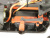 Радиоуправляемый шорт-корс Remo Hobby Rocket UPGRADE V2.0 (оранжевый) 4WD 2.4G 1/16 RTR