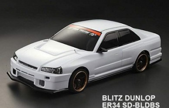 Кузов Nissan GTR (R34) Blitz Dunlop не окрашенный с отражателями, наклейками и спойлером 1:10